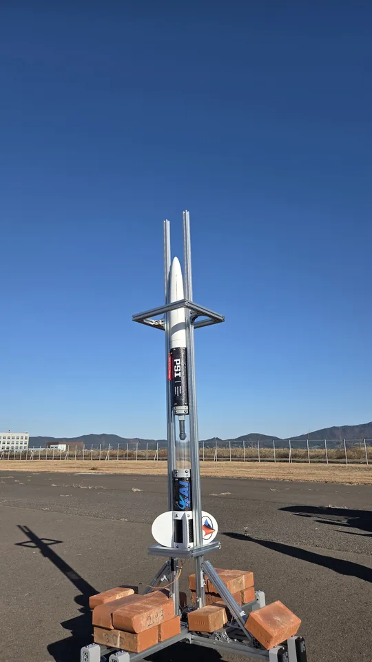 The rocket mounted on its launch rail.