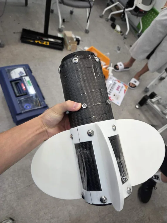 Checking the assembled rear fins of the vehicle.